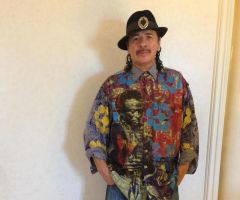 Carlos Santana retracts apology for saying 'a woman is a woman and a man is a man' 