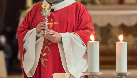 'Rocker' priest dies from severe burns after his vestments catch fire during Easter vigil