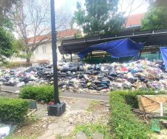 Authorities allow 2 years' worth of uncollected garbage to pile up near church