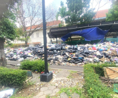 Authorities allow 2 years' worth of uncollected garbage to pile up near church