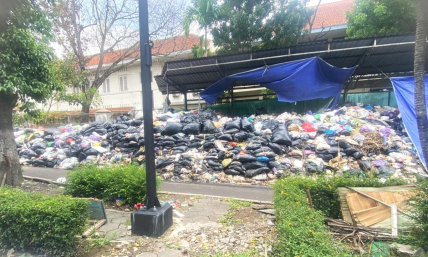 Authorities allow 2 years' worth of uncollected garbage to pile up near church