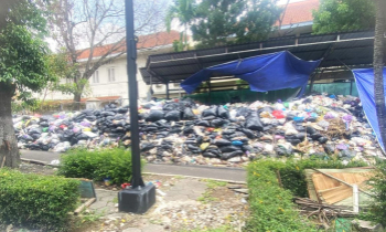 Authorities allow 2 years' worth of uncollected garbage to pile up near church