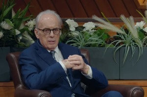 John MacArthur undergoing physical therapy after being bedridden in hospital