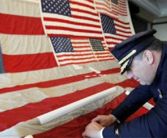 Americans Stitch Up Tattered 9/11 Flag