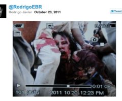 Muammar Gaddafi Dead: Photo of Bloodied Libyan Leader Circulates (GRAPHIC PICTURE)